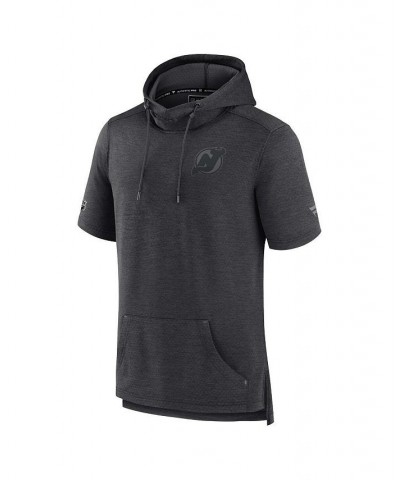 Men's Branded Heather Charcoal New Jersey Devils Authentic Pro Road Performance Short Sleeve Pullover Hoodie $30.36 Sweatshirt